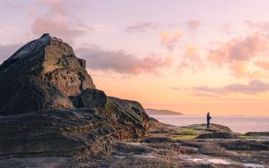 Preview wallpaper beach, coast, silhouette, rock, sea