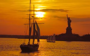 Preview wallpaper boat, masts, sails, sea, sunset