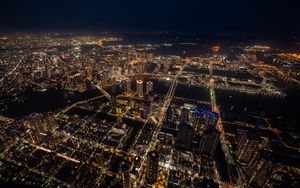 Preview wallpaper buildings, skyscrapers, lights, aerial view, height, city, night