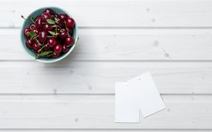 Preview wallpaper cherry, leaves, bowl, wood, white