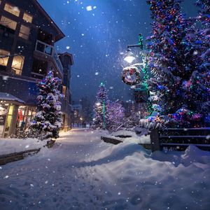 Preview wallpaper christmas, new year, winter, street, snowfall, mood