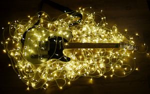 Preview wallpaper electric guitar, guitar, music, garland, glow