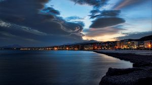 Preview wallpaper evening, beach, city, sky, sea