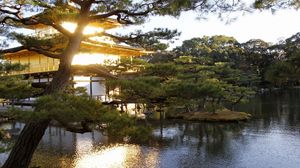 Preview wallpaper evening, japan, mansion, water, garden, trees