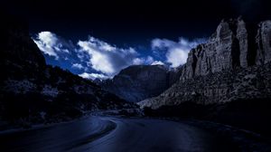 Preview wallpaper evening, road, rocks, sky