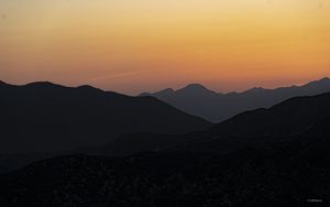 Preview wallpaper hills, silhouettes, mountains, sunrise, landscape