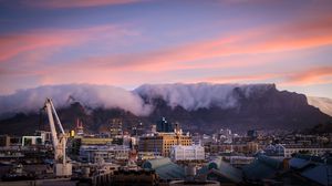 Preview wallpaper houses, buildings, mountains, clouds, city