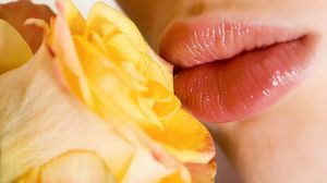 Preview wallpaper lips, flower, yellow, pink, tender