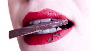 Preview wallpaper lips, teeth, chocolate, girl, lipstick