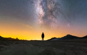 Preview wallpaper man, silhouette, night, milky way, alone