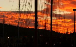 Preview wallpaper masts, silhouettes, trees, sky, evening