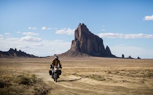 Preview wallpaper motorcycle, bike, motorcyclist, biker, rock, desert