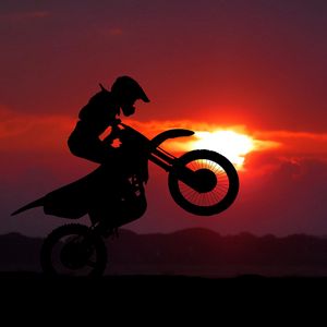 Preview wallpaper motorcycle, motorcyclist, cross, stunt, silhouette, sunset