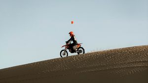 Preview wallpaper motorcycle, motorcyclist, rally, sand, desert