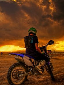 Preview wallpaper motorcyclist, motorcycle, sunset