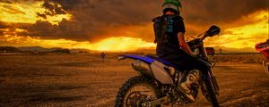 Preview wallpaper motorcyclist, motorcycle, sunset