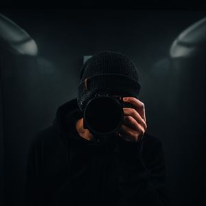 Preview wallpaper photographer, camera, dark, black