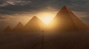 Preview wallpaper pyramids, sun, desert, silhouette, sunset