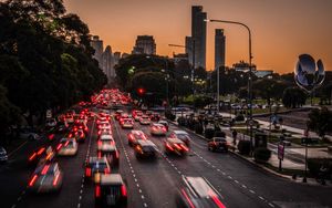 Preview wallpaper road, cars, buildings, city, evening