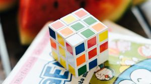 Preview wallpaper rubiks cube, puzzle, book, light