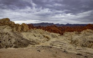 Preview wallpaper sand, mountains, stones, clouds, dark, nature