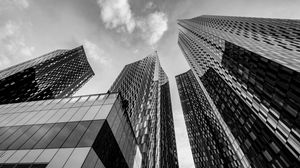 Preview wallpaper skyscrapers, bottom view, black and white, buildings, architecture