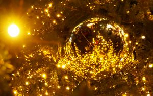 Preview wallpaper spruce, ball, branches, garland, glare, new year, christmas