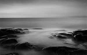 Preview wallpaper stones, sea, dark, horizon, nature