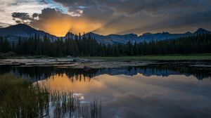 Preview wallpaper sunset, lake, grass, reflection, mountains